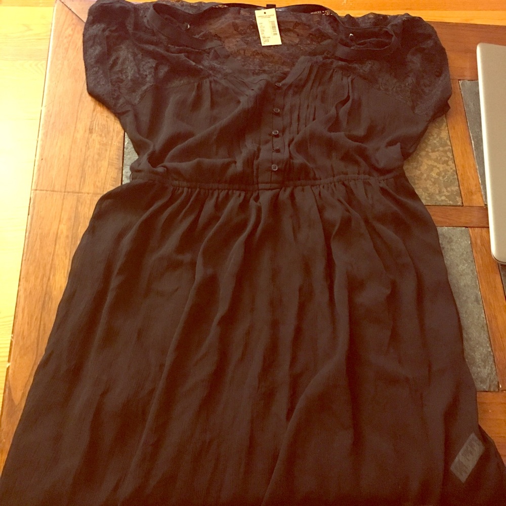 Brand New black mini dress.